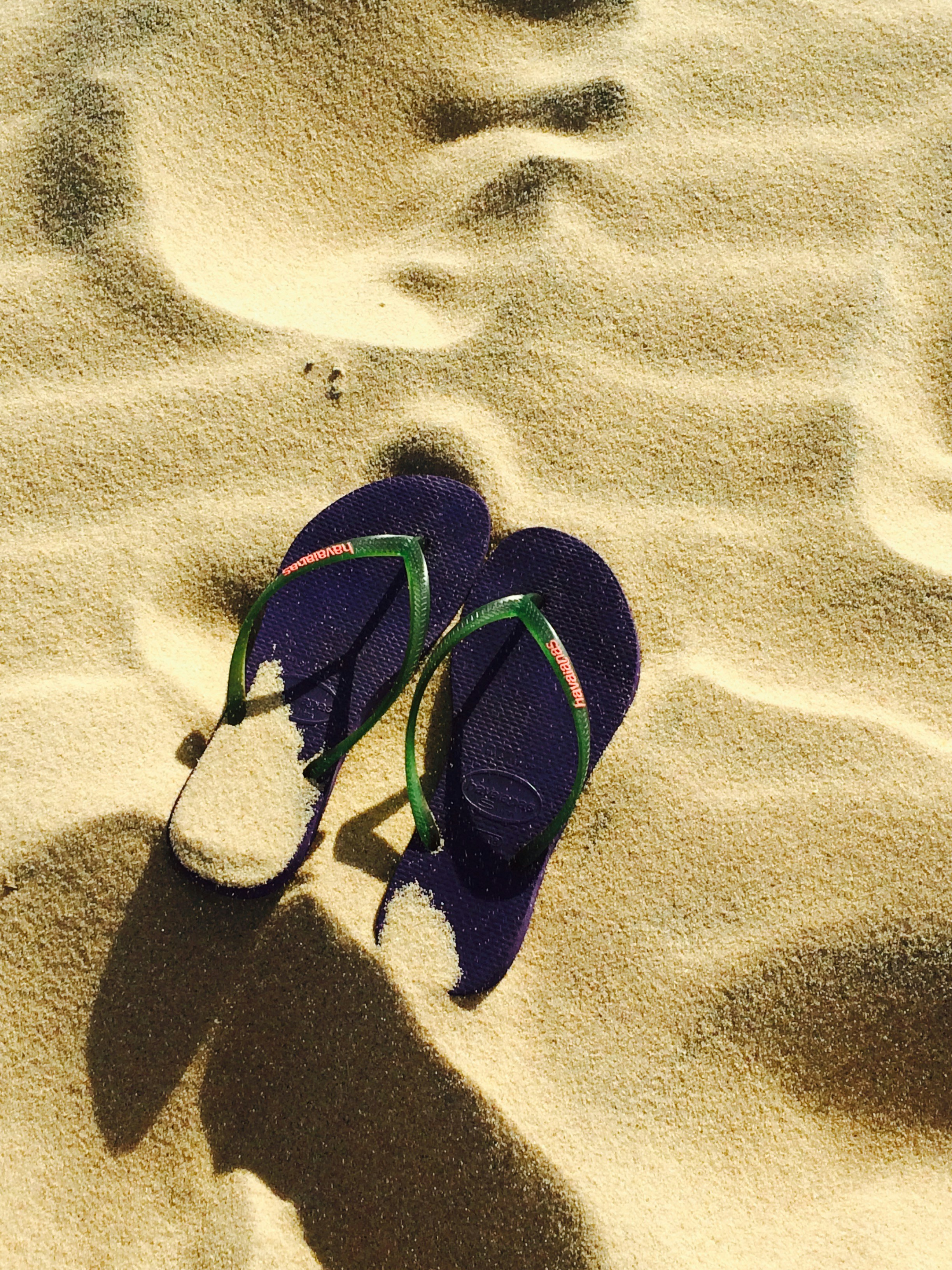 flip flops in the sand