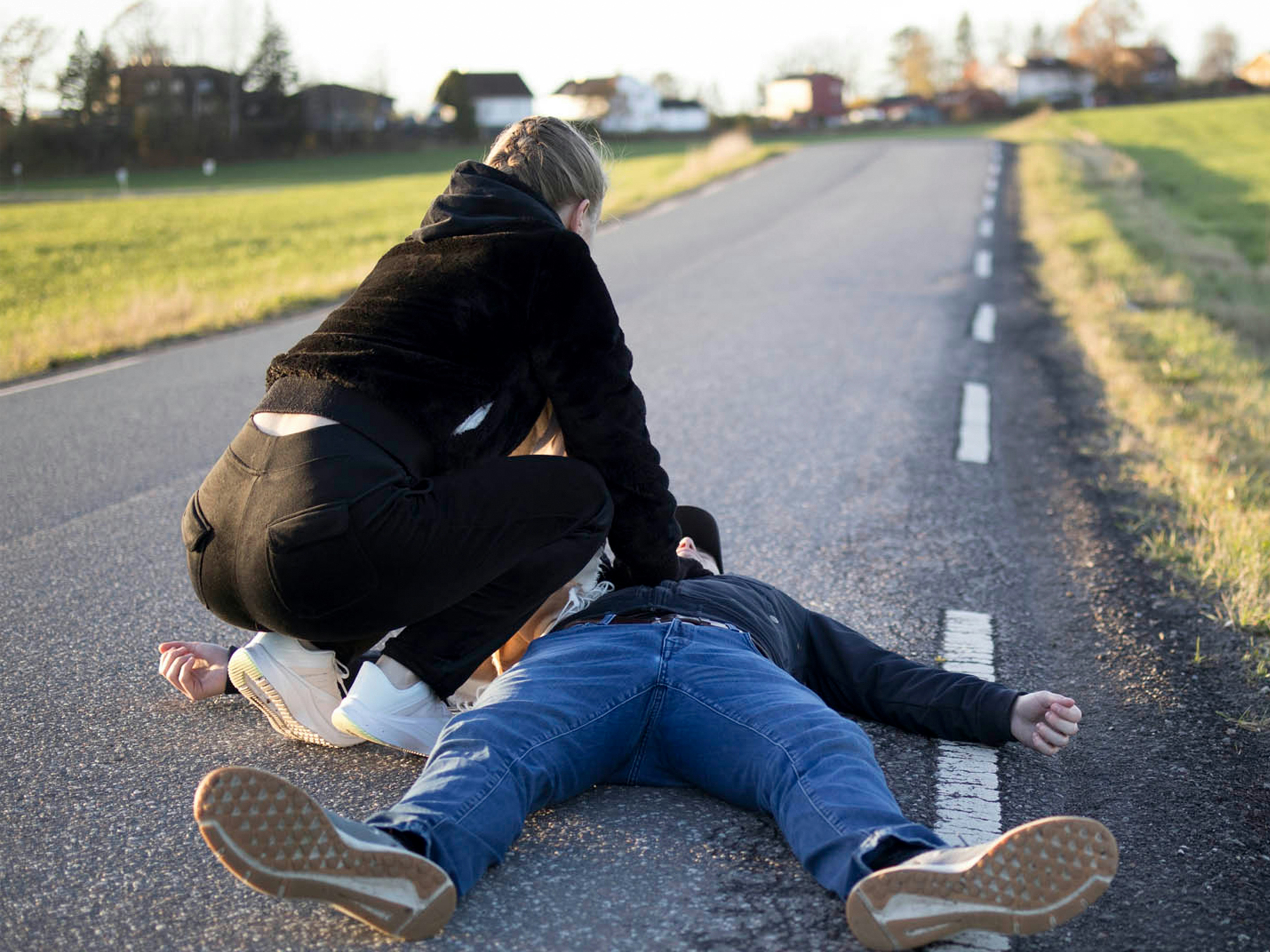 one person performing cpr on another person