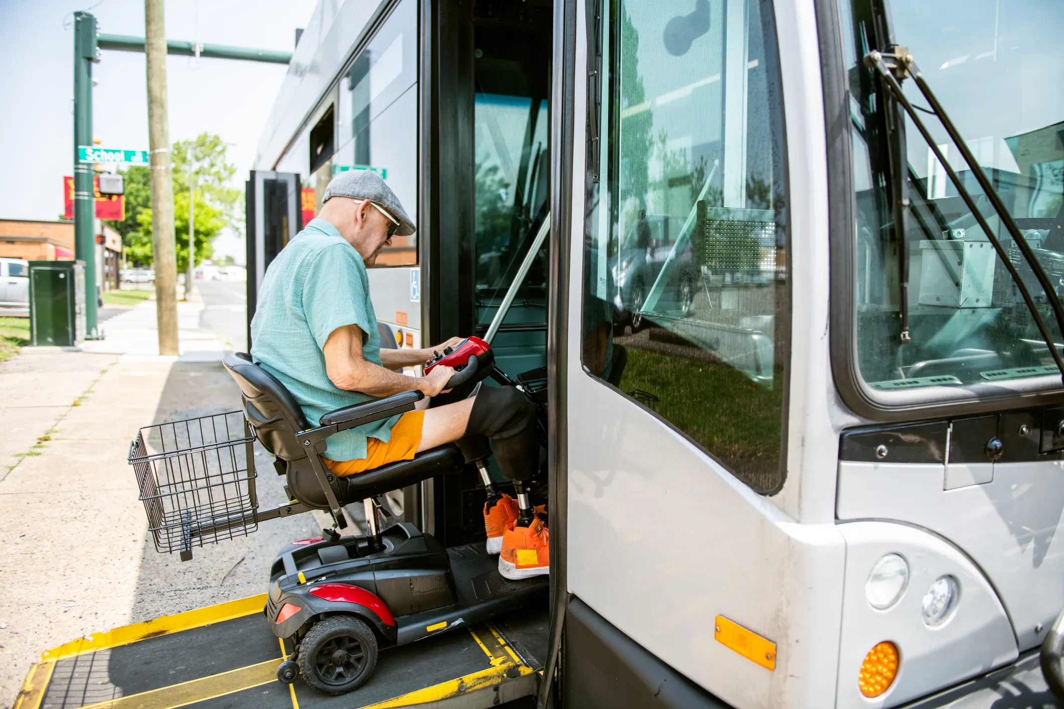 man going up a wheel chair ramp
