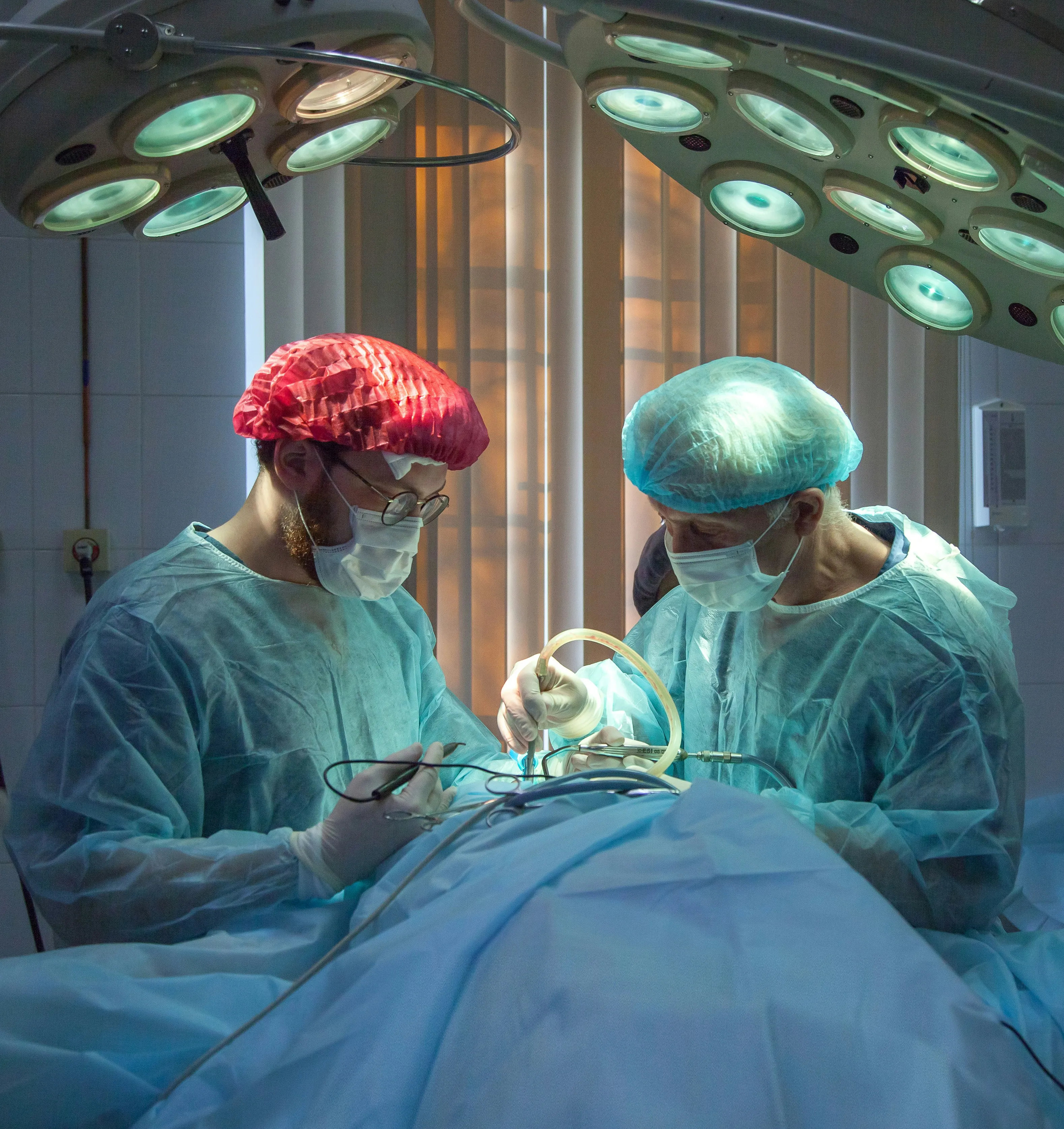 surgeons performing surgery